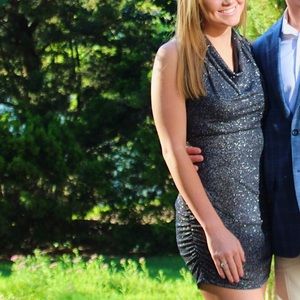 Black-glittery fitted dress